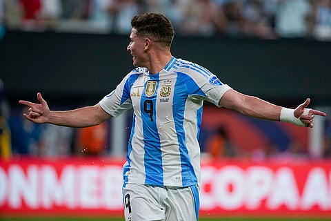 Argentina's Julian Alvarez celebrates scoring opening goal